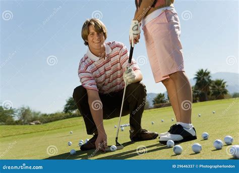 Man Teaching Woman To Play Golf Stock Image Image Of Portrait Ball