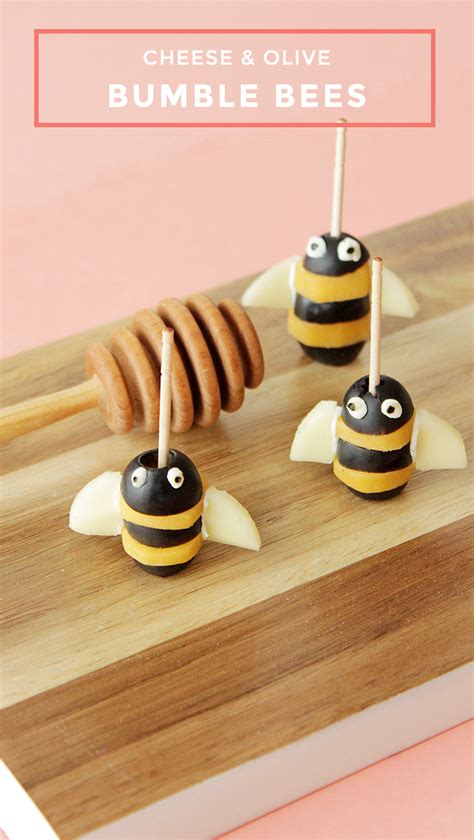 A Fun Snack Recipe For Cheese And Olive Bumble Bees By Glitter And