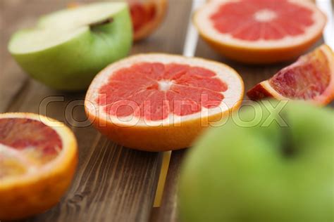 Mix Of Fresh Sliced Fruits On A Wooden Stock Image Colourbox