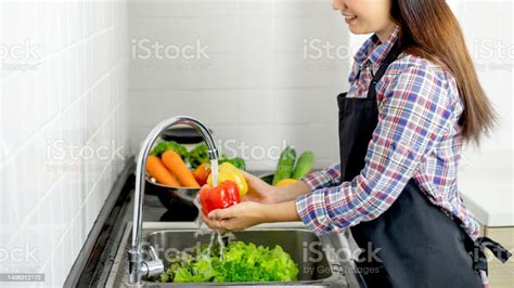 Lifestyle Beautiful Asian Healthy Girl Fill Happy Washing Vegetables In