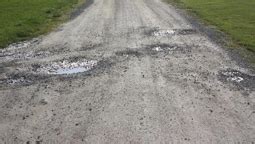 This is a nice gravel drive on land i own. Driveway repairs | Lenz Enterprises | Stanwood | Arlington | Marysville