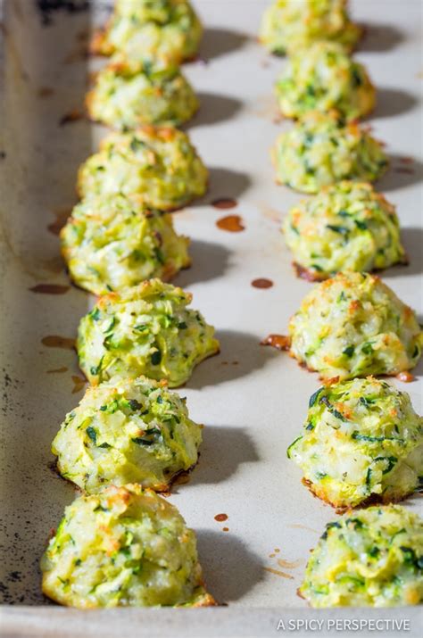 Working in batches, dip zucchini strips into egg mixture, shake to remove any excess, and roll strips in bread crumb mixture to coat. Healthy Baked Zucchini Tots - A Spicy Perspective