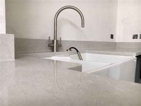 Cosmopolitan White Quartz From Caesarstone Fabricated And Fitted By