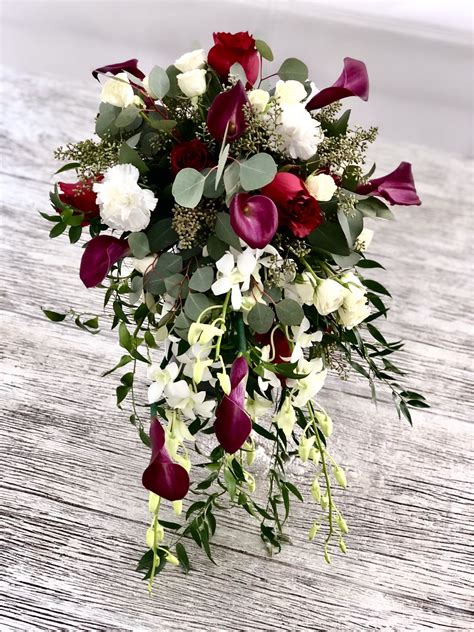 Bridal bouquet wedding bouquet cascading bouquet white cream. Gorgeous cascading bouquet with the touch of burgundy ...