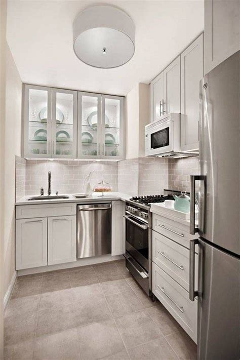 Looking for a kitchen layout, with space for multiple cooks and onlookers? Stainless Steel Dishwasher And White Cabinets Plus Cool ...