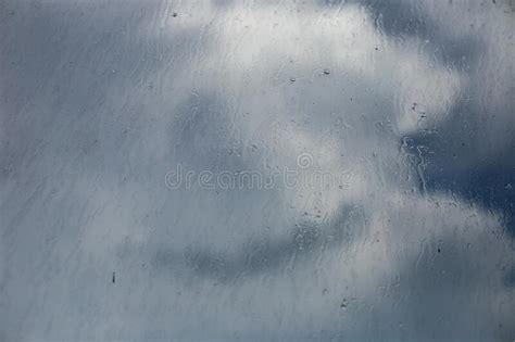 Raindrops On The Window Behind The Clouded Sky Stock Image Image Of