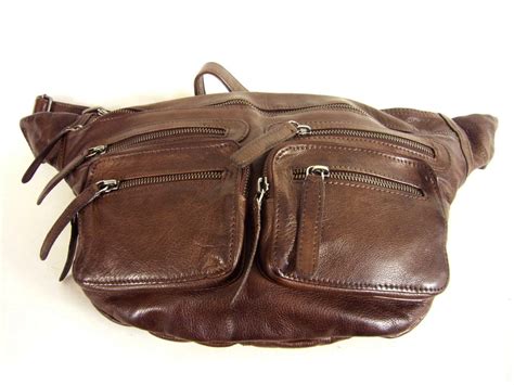 Les sacs polochons de kipling sont parfaits pour aller à la gym, partir en weekend ou pour des longs voyages. Sac fourre-tout homme cuir marron LY / Dixie - Espritcuir.com