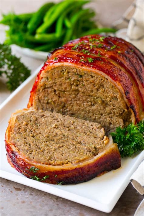 Traeger smoked meatloaf has layers of flavor. Bacon Wrapped Meatloaf - Dinner at the Zoo
