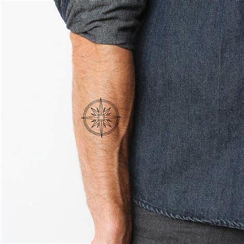 Black Minimal Compass Tattoo