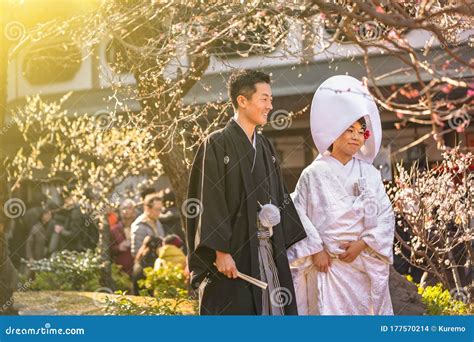 Traditional Japanese Shinto Wedding Of A Couple In Black Haori Kimono