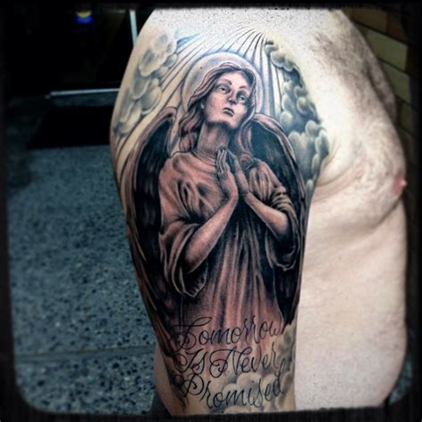 Incredible Praying Angel With Clouds Tattoo