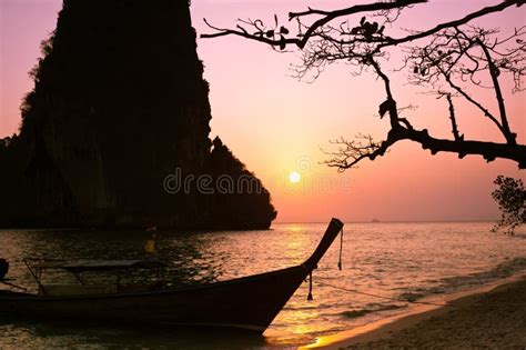 Sunset At Tropical Beach Landscape With Thai Traditional Boat An Stock