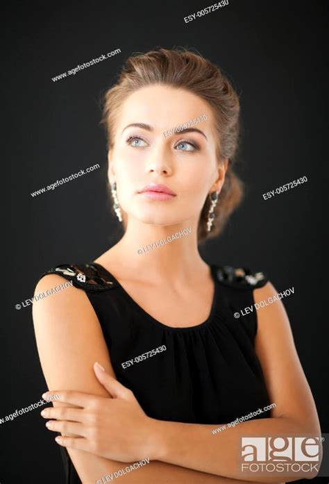 Beautiful Woman In Evening Dress Wearing Diamond Earrings Stock Photo