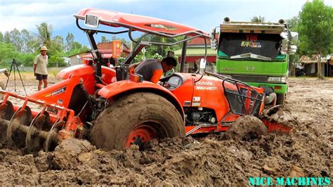 Extreme Tractor Kubota M6040su Stuck In Deep Mud Dump Truck Recovery