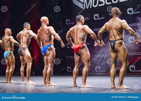 Bodybuilders Show Their Physique On Stage In Championship Editorial Stock Image Image Of Grand