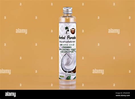 Coconut oil editorial photo. Herbal Paradise Organic Cold Pressed