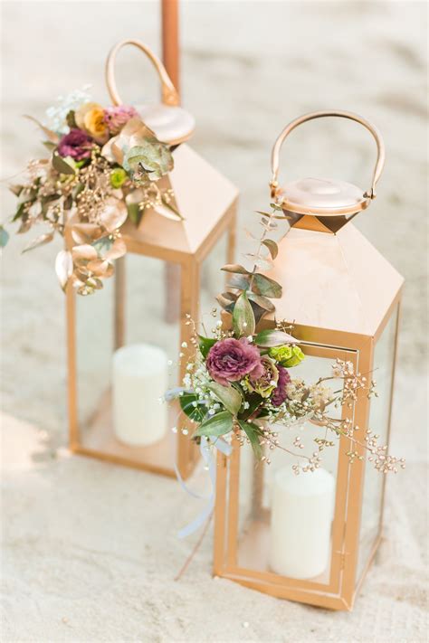 Say i do with a view of the pacific ocean at the sheraton kauai resort. Lantern decorated with flower in gold-copper theme # ...