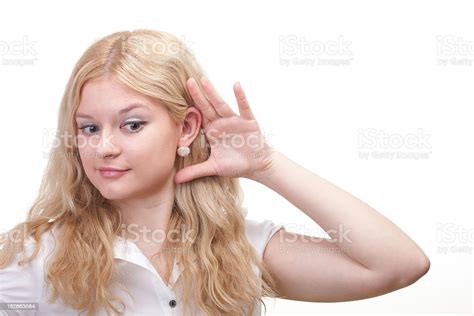 Woman Eavesdropping With Hand Behind Her Ear Stock Photo Download