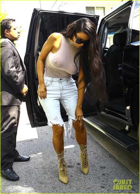 Photo Kim Kardashian Goes Braless While Wearing See Through Top