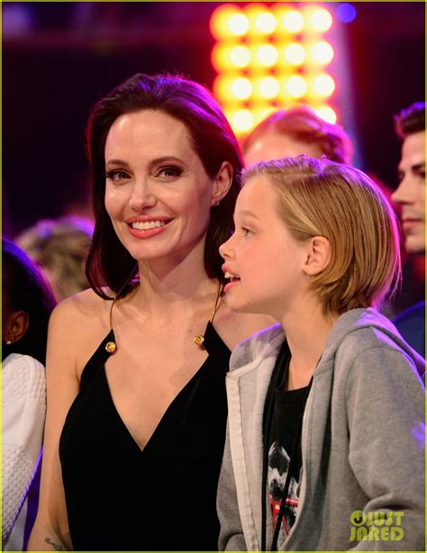 The kids handed the leash back and forth to share the dog duties. Angelina Jolie Brings Shiloh & Zahara to Kids' Choice ...