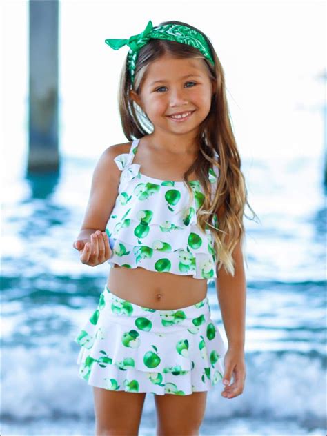 mia belle girls white apple print ruffled top and skirted bottom two piece swimsuit