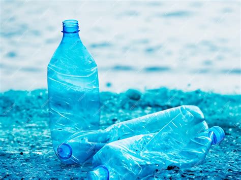 Premium Ai Image Plastic Water Bottles Pollution In Ocean Environment