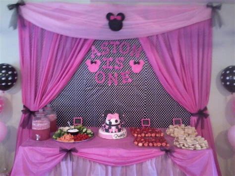 Baby shower and children happy birthday party backdrop. Cake and food table for Aston's Minnie Mouse birthday ...
