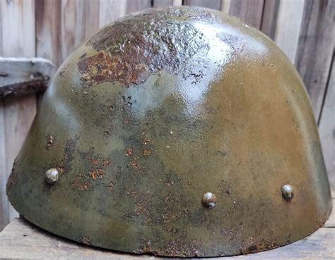 large ww2 czech helmet with signature remnants from karelia