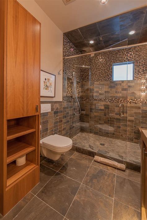 It features a slatted top and bottom shelf to make it lightweight. Wonderful Tiled Shower Bench Transitional Bathroom ...