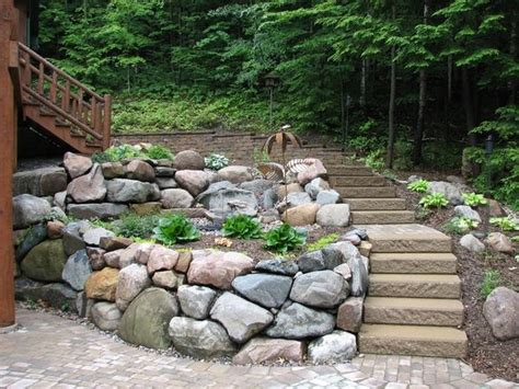 We rounded up our best retaining wall ideas so you can plan your diy landscaping project. Boulder retaining wall design - eye catching garden wall ideas