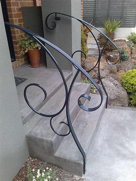 Staircase railing design outdoor stair railing interior stair railing wrought iron stair railing balcony railing design stair handrail railing whether for your stairs, balcony or room divider, in wrought iron or aluminum, gainesville ironworks creates custom railing to your specifications. outside steps | Outdoor handrail, Wrought iron stair ...