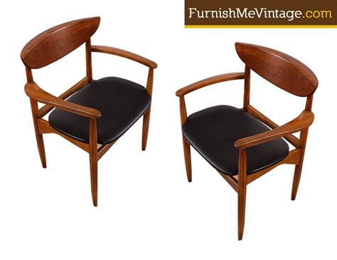 The additional leaf is 12 inches wide, making a maximum table width of 93.5 inches when the leaf is used. Pair of Lane Perception Mid Century Modern Arm Chairs