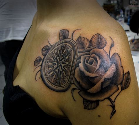 The meaning of the shoulder rose tattoo is no different than a rose tattoo on the hand. 30 Great Compass Tattoos for both Men and Women