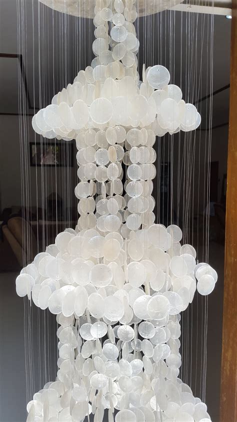 Beautiful large capiz shell chandelier with coconut pagoda roof and brass rings. Three-Tier Capiz Shell Chandelier 40" - Chandeliers ...