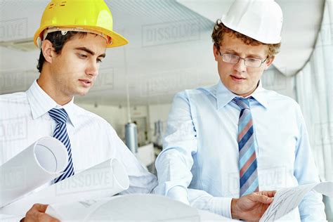 Two Professional Engineers Planning The Construction Stock Photo