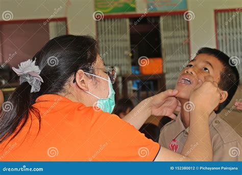 Doctor Is Checking The Oral Cavity Of A Student Editorial Photography