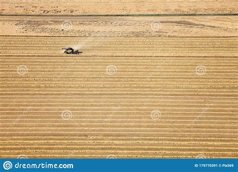 An Aerial Image Of A Wheat Field Being Harvested Stock Image Image