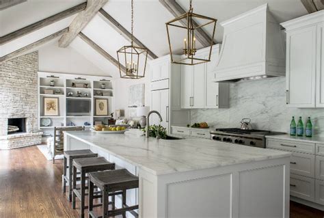 The kitchen ceiling is often forgotten in the scheme of designing your new dream kitchen. Remodeled White Kitchen with Vaulted Ceiling Beams - Home ...