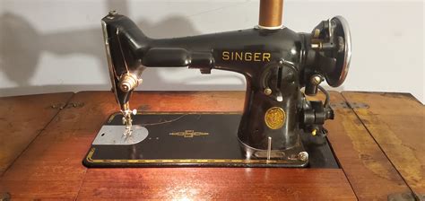 value of 1936 singer sewing machine with parlor cabinet