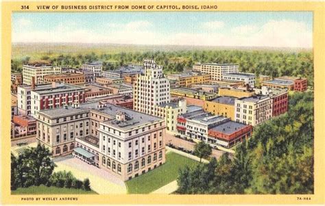 An Old Postcard Shows The View Of Business District In Capital Kansas