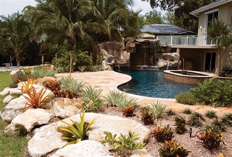 Custom Swimming Pool With Natural Stone Waterfalls And