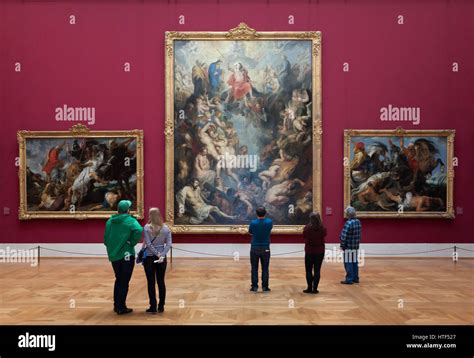Visitors In Front Of The Paintings By Flemish Painter Peter Paul Rubens