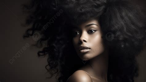 Woman With Curly Afro Hair Posing In Front Of A Black Background Black