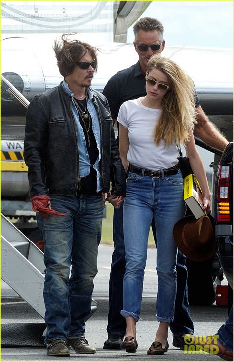 Johnny Depp And Amber Heard Hold Hands For Australian Arrival Photo 3352010 Amber Heard Johnny