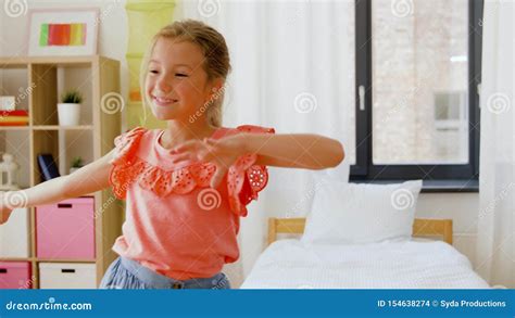 Happy Little Girl Dancing In Her Room At Home Stock Footage Video Of