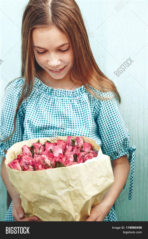 Tween Girl Holding Image And Photo Free Trial Bigstock