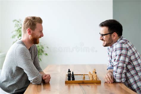 Portrait Of Two Young Man Playing Chess Stock Image Image Of Business
