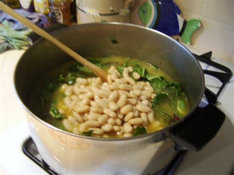 Add the parmesan rinds, fresh thyme, parsley, water, and sea salt to the dutch oven and stir and bring to a boil. What To Do With Your Parmesan Rind Collection