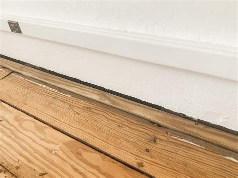 How To Fill Gaps Between Floor And Wall Trim Midcounty Journal