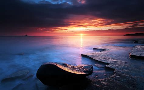 Coast Shore Beaches Stone Rock Ocean Sea Water Sky Clouds Sunset Sunrise Reflection Wallpaper